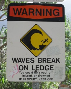 Sign - Waves Break On Ledge